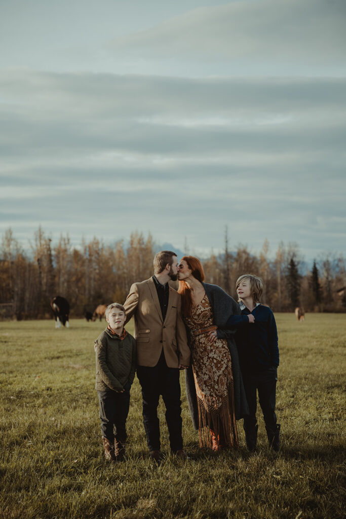 couple kissing during their photoshoot