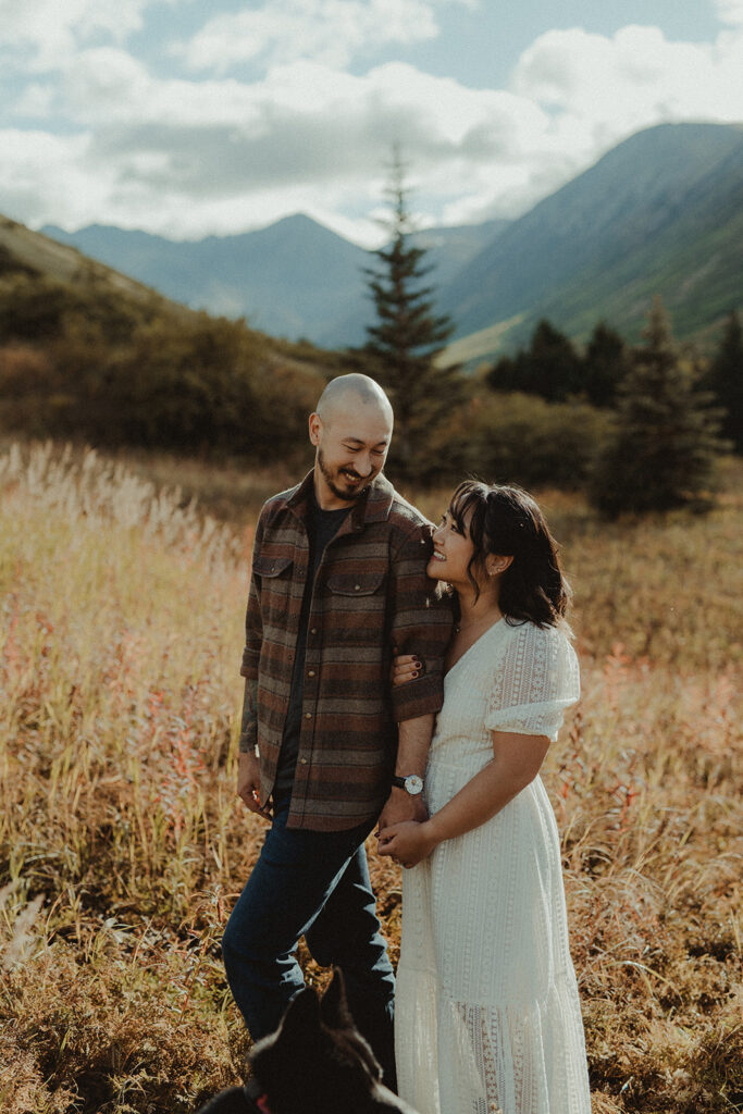 couple looking at each other during their photoshoot 