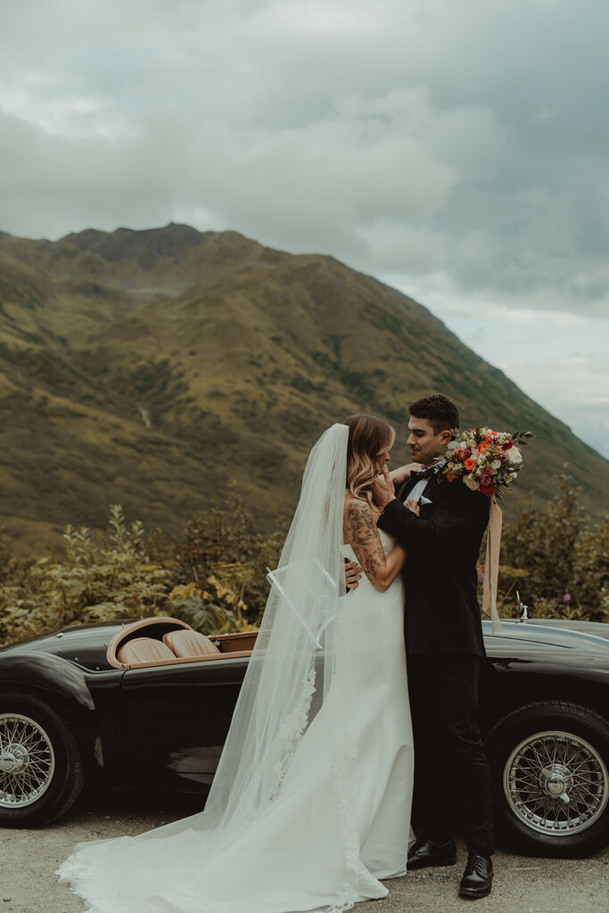 picture of the bride and groom smiling at each other - vintage glam styled shoot