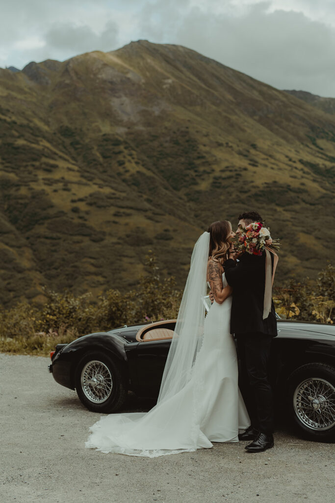 bride kissing the groom on the cheek