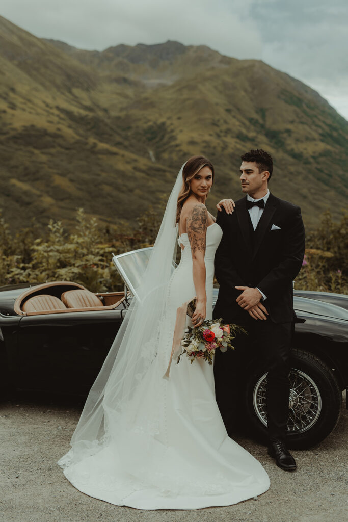 bride and groom posing for the camera during their elopement photoshoot