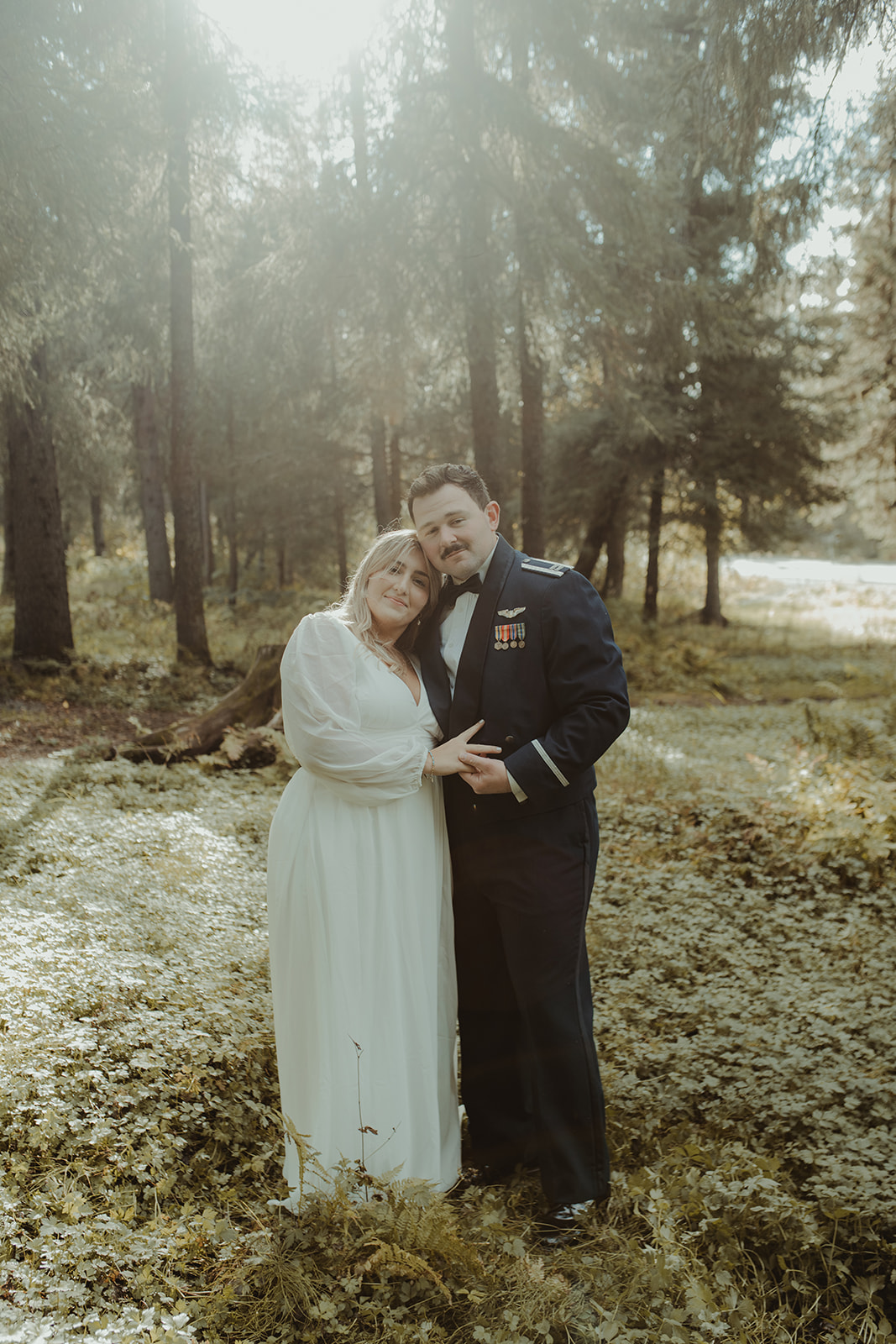 cute couple posing for the camera during their elopement photoshoot